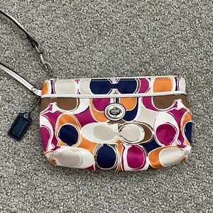 Multi colored coach wristlet